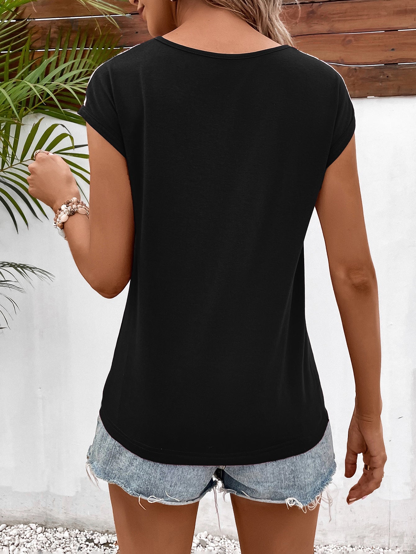 Ivy Lane Spliced Lace V-Neck Twisted Hem Tee