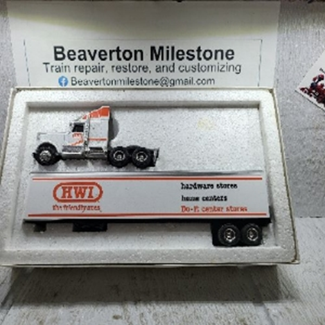 ERTL HWI INTERNATIONAL CAB WITH TRAILER 9664-1HUO