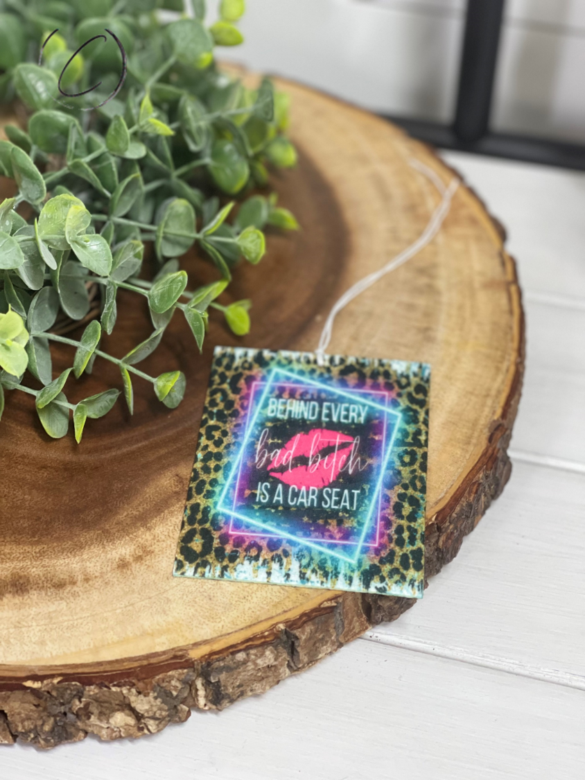 Behind Every Bad B**** Car Freshener by CMD Wholesale