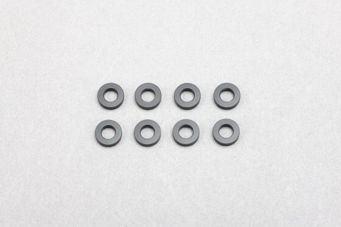 ZC-A3615BA Yokomo 3x6x1.5mm Aluminum Shims (Black) (8)