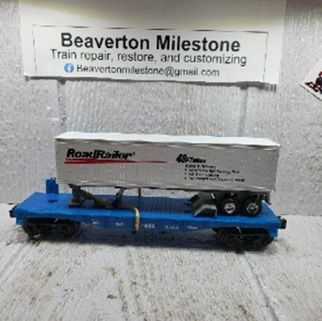 LIONEL INTERMODALSERVICE FLATCAR WITH WHEEL CHOCKS, 95