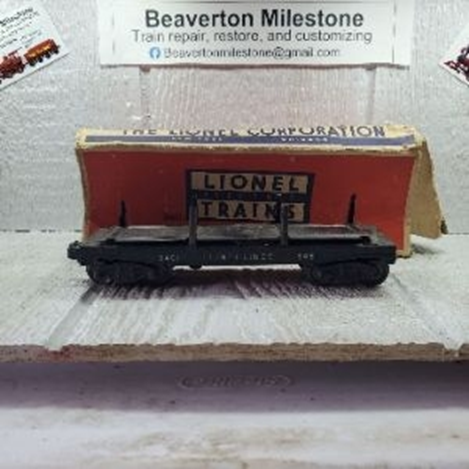 LIONEL LL OPERATING LOG CAR, 49-55 (B) BLACK CAR, RUBBER-STAMPED LETTERING