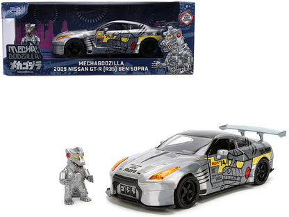 2009 Nissan GT-R (R35) Ben Sopra Brushed Metal with Black Top and Graphics and Mechagodzilla Diecast Figure "Godzilla" Franchise "Anime Hollywood Rides" Series 1/24 Diecast Model by Jada  free shipping USA