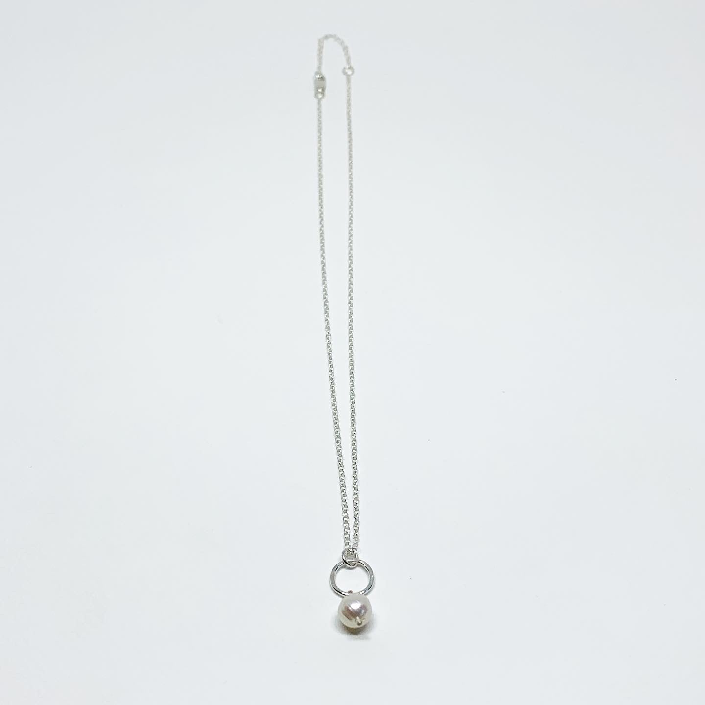 Pearl Drop Charm Necklace by Jennifer Cervelli Jewelry