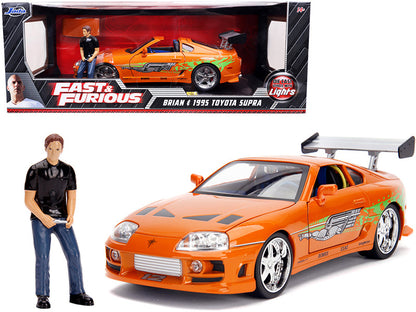 1995 Toyota Supra Orange Metallic with Lights and Brian Figurine "Fast & Furious" Movie 1/18 Diecast Model Car by Jada  free shipping USA