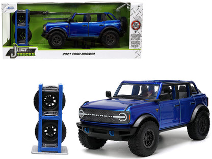 2021 Ford Bronco Open-Top Candy Blue Metallic with Extra Wheels "Just Trucks" Series 1/24 Diecast Model Car by Jada  free shipping USA