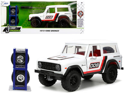 1973 Ford Bronco #008 White with Red and Black Stripes and Red Interior with Extra Wheels "Just Trucks" Series 1/24 Diecast Model Car by Jada  free shipping USA