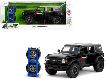 2021 Ford Bronco Badlands Black "Rigid" with Extra Wheels "Just Trucks" Series 1/24 Diecast Model Car by Jada  free shipping USA