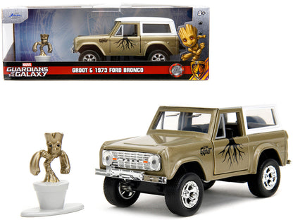 1973 Ford Bronco Gold Metallic with White Top and Groot Diecast Figure "Guardians of the Galaxy" "Marvel" Series 1/32 Diecast Model Car by Jada  free shipping USA