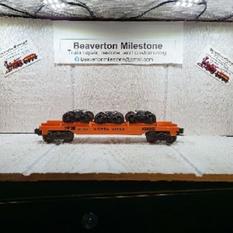LIONEL TRUCK CAR WITH 3 TRUCKS VARIATION (B) DULL ORANGE 55-56