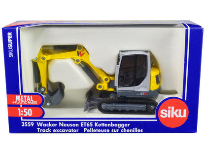 Wacker Neuson ET65 Track Excavator Yellow and Gray 1/50 Diecast Model by Siku  free shipping USA