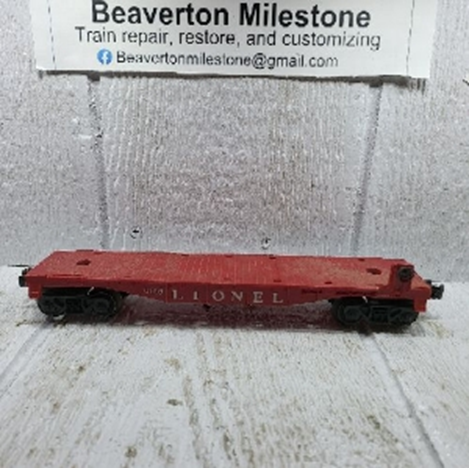 LIONEL FLATCAR WITH ALLIS - CHALMERS BULLDOZER VARIATION (A) RED CAR