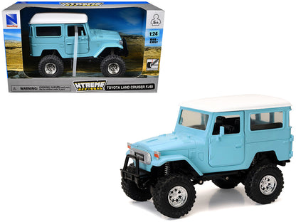 Toyota Land Cruiser FJ40 Light Blue with White Top "Xtreme Off-Road" Series 1/24 Diecast Model by New Ray  free shipping USA