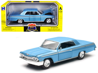 1962 Chevrolet Impala SS Blue 1/25 Diecast Model Car by New Ray  free shipping USA