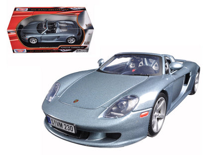 Porsche Carrera GT Silver with Black Interior 1/18 Diecast Model Car by Motormax  free shipping USA