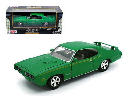 1969 Pontiac GTO Judge Green with Stripes 1/24 Diecast Model Car by Motormax  free shipping USA