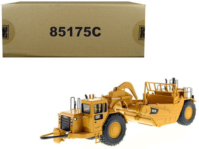 CAT Caterpillar 657 G Wheel Tractor Scraper with Operator "Core Classics Series" 1/50 Diecast Model by Diecast Masters  free shipping USA