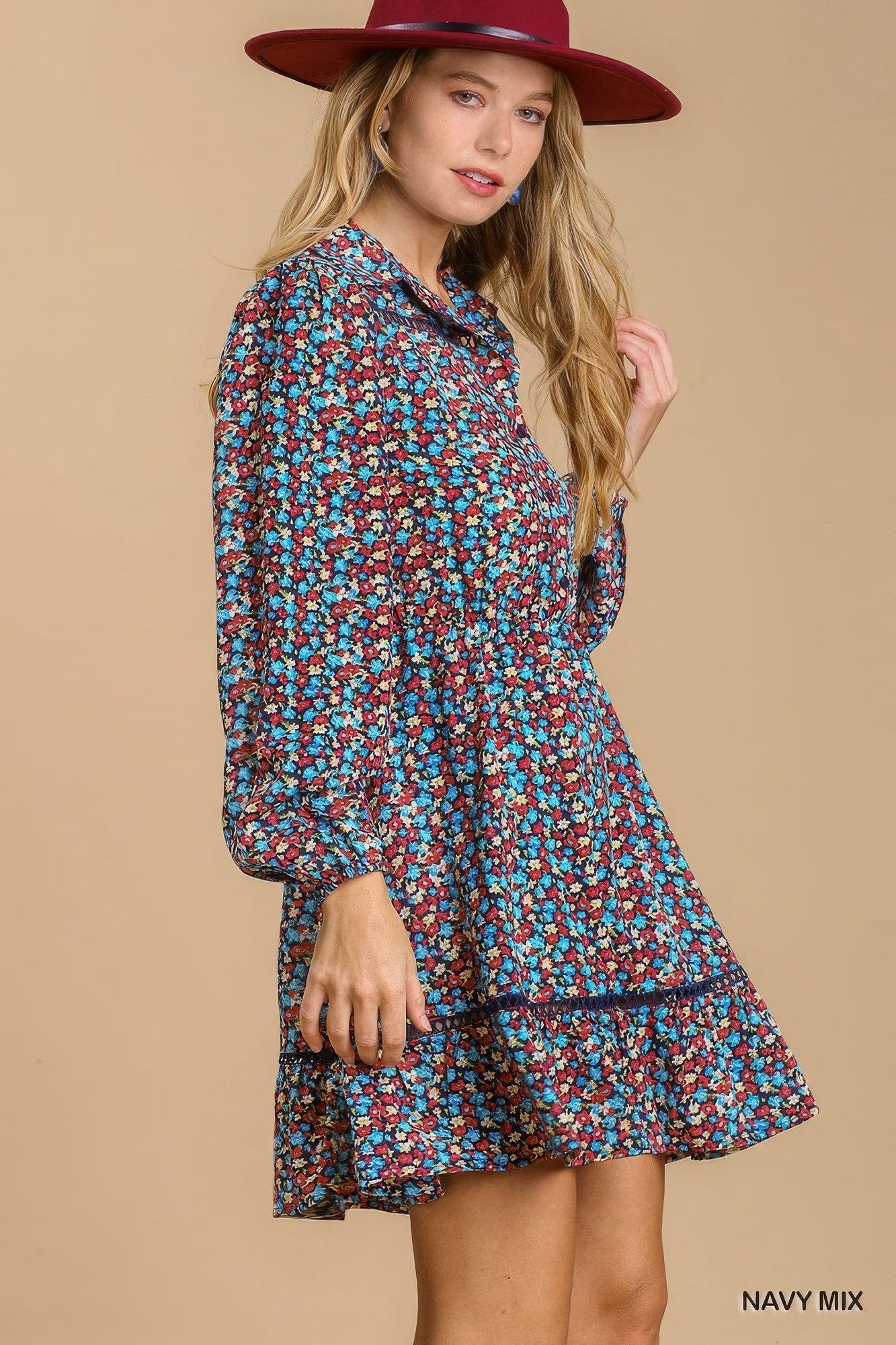Collared neckline button down floral print dress with crochet trimmed details by Balec Group