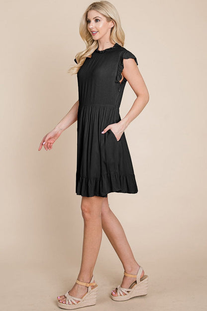 Ruffled Sleeveless Babydoll dress with pockets by RolyPoly Apparel