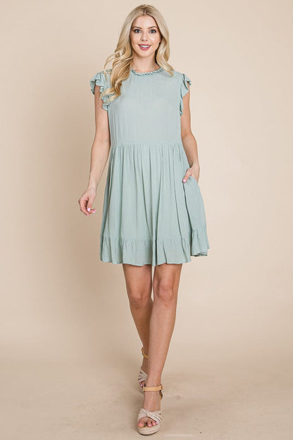 Ruffled Sleeveless Babydoll dress with pockets by RolyPoly Apparel