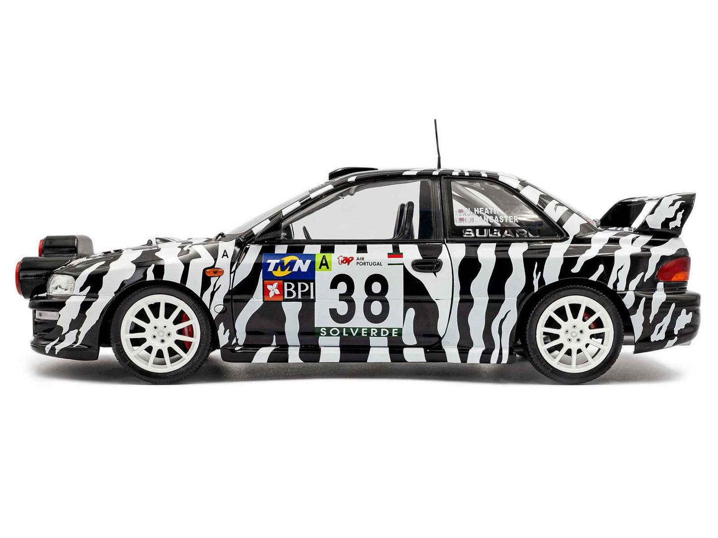 Subaru Impreza S5 WRC99 #38 Nigel Heath - Steve Lancaster "Rallye de Portugal" (2001) "Competition" Series 1/18 Diecast Model Car by Solido