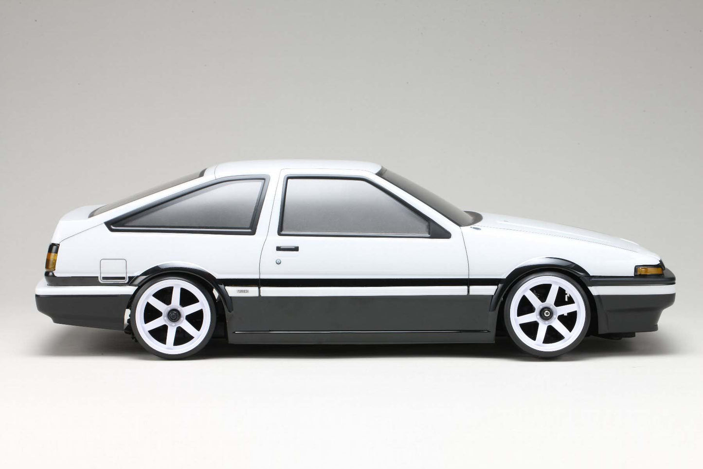 SD-AE86T3B Yokomo Toyota Sprinter Trueno AE86 3-Door Drift Body w/Light Decal (Clear)