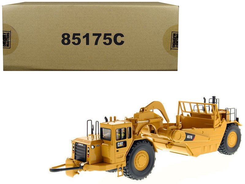 CAT Caterpillar 657 G Wheel Tractor Scraper with Operator "Core Classics Series" 1/50 Diecast Model by Diecast Masters  free shipping USA