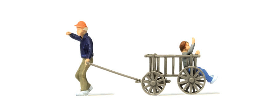 Preiser 28112 HO Scale Man Pulling Child in Cart Set