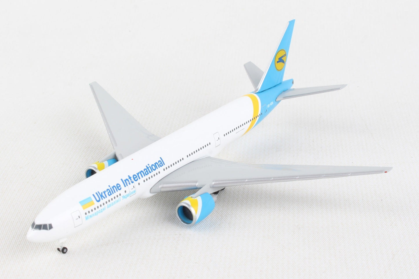 Herpa Wings HE531122 Ukraine 777-200 1/500