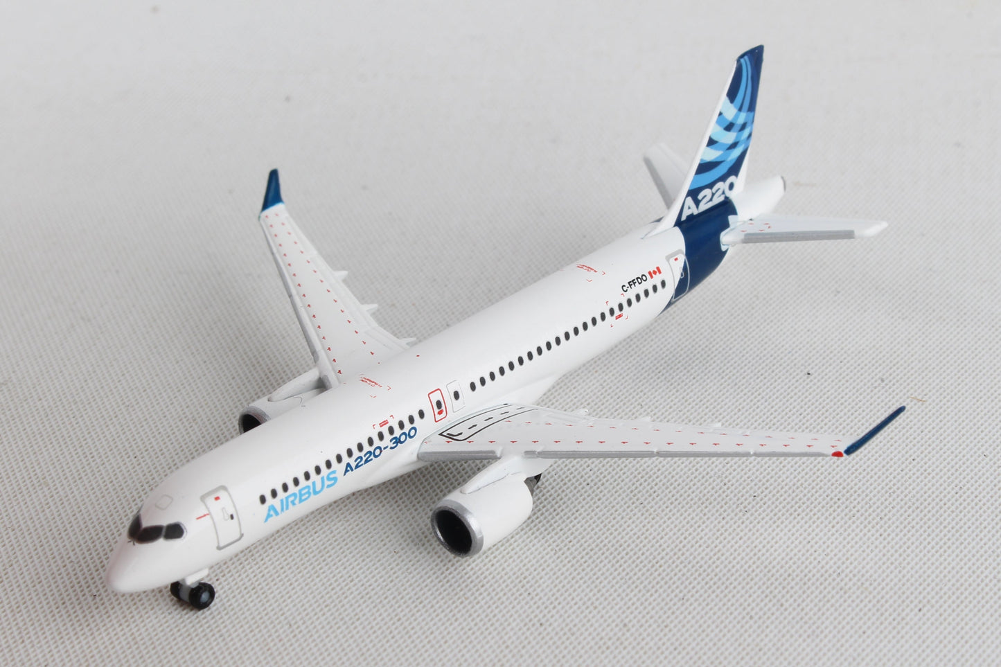 Herpa Wings HE532822 Airbus House A220-300 1/500
