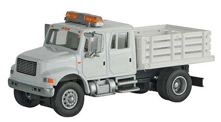 Walthers SceneMaster 949-11895 HO Scale International(R) 4900 Crew-Cab Open Stake-Bed Utility Truck - Assembled -- White with Utility Company decals